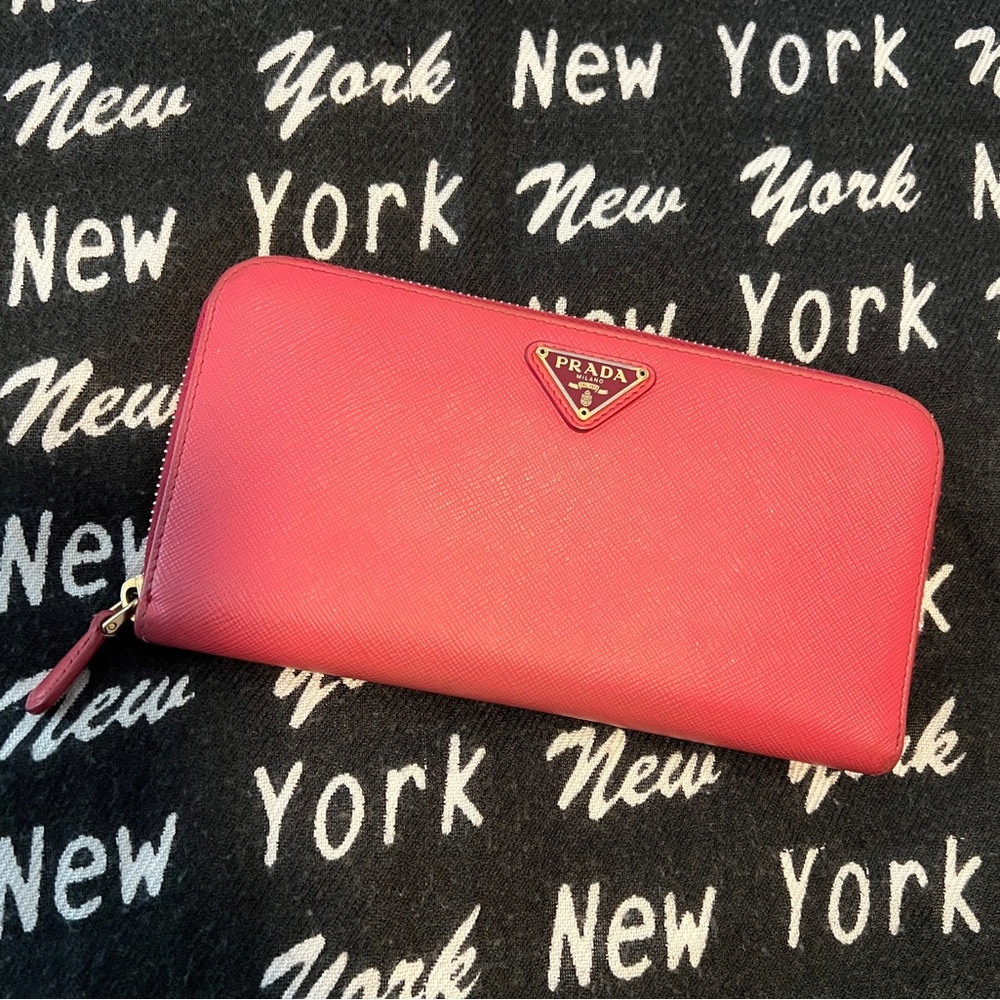 Pink Prada Saffiano leather full zip around wallet